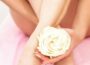 white-rose-meaning-woman-holding-in-front-of-legs