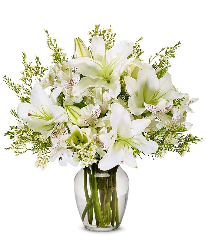 Arreglo floral con lirios blancos