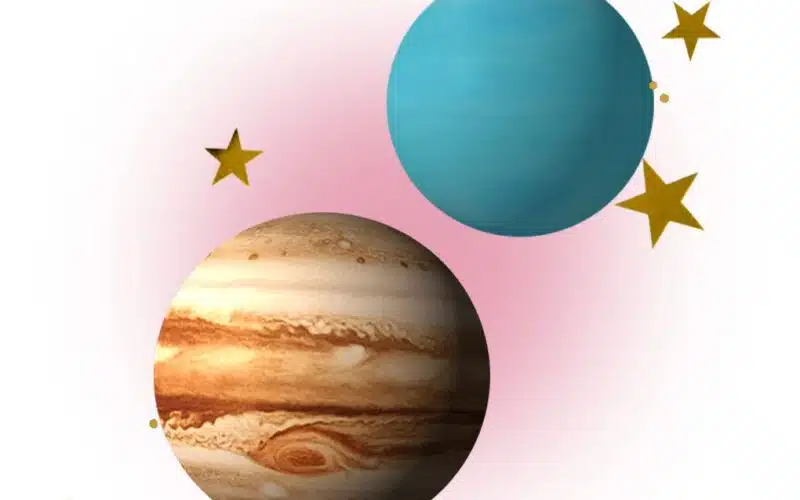 What you need to know about the Jupiter–Uranus conjunction — Jupiter and Uranus in front of a red orb, surrounded by gold stars.